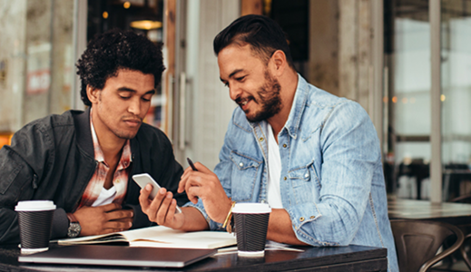 Customers chatting at a table